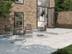 Terrasse mit Platten in hellgrauer Kalksteinoptik Sevilla Pearl